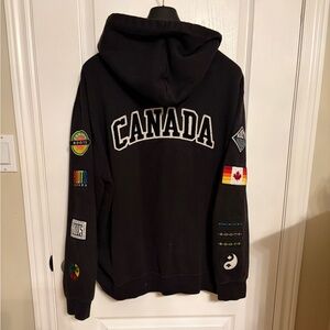 Retro Roots Canada Black Hoodie Sweater with Patch Details